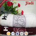 wholesale alibaba 100% organic cotton face towel with logo